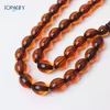 مسبحة أكريليك 33 حبة بيضاوية 12×14 مم بزينة ثلاثية – B7-33F-4 — B7-33F-4 L36 — درجات برتقالية كهرمانية المظهر