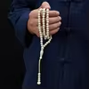 مسبحة أكريليك مخططة 99 حبة 7 مم — A113-99C2-5 — كريمي فاتح — Blue