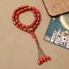مسبحة أكريليك 33 حبة بيضاوية 10 × 15 مم — E5-33B-2 — أحمر — E5-33B-2-K60