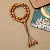 مسبحة أكريليك 33 حبة بيضاوية 10 × 15 مم — E5-33B-2 — بني فاتح — E5-33B-2-K109