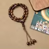 مسبحة أكريليك 33 حبة بيضاوية 10 × 15 مم — E5-33B-2 — بني داكن — E5-33B-2-K123