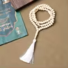 مسبحة أكريليك 99 حبة وشرابة بسبعة خيارات — F1-99E4-1 — أبيض عاجي — White