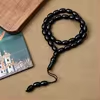مسبحة أكريليك من 33 خرزة بيضاوية 10×13 مم – E3-33C4 — Black — أسود مع خيط داكن