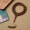 مسبحة أكريليك من 33 خرزة بيضاوية 10×13 مم – E3-33C4 — Coffee — بني شفاف مع خيط بني