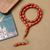 مسبحة أكريليك من 33 خرزة بيضاوية 10×13 مم – E3-33C4 — Red-1 — أحمر طوبي مع خيط متناسق