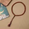 مسبحة أكريليك من 33 خرزة بيضاوية 10×13 مم بشرابة خيط – E3-33E1-2 — Red-2 — أحمر داكن مع شرابة متناسقة