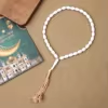 مسبحة أكريليك من 33 خرزة بيضاوية 10×13 مم بشرابة خيط – E3-33E1-2 — White — أبيض مع شرابة فاتحة