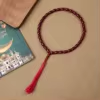 مسبحة أكريليك من 33 خرزة بيضاوية 10×13 مم بشرابة خيط – E3-33E1-2 — Red-3 — أحمر داكن مع شرابة حمراء