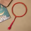 مسبحة أكريليك من 33 خرزة بيضاوية 10×13 مم بشرابة خيط – E3-33E1-2 — Red-1 — أحمر مع شرابة حمراء