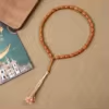 مسبحة أكريليك من 33 خرزة بيضاوية 10×13 مم بشرابة خيط – E3-33E1-2 — Brown — بني دافئ مع شرابة فاتحة