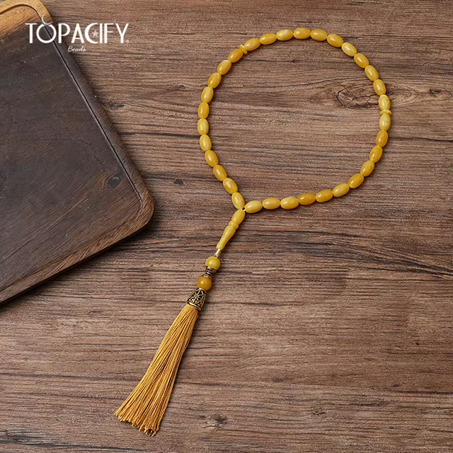 مسبحة أكريليك صفراء بنهايات وشرابات متنوعة — J3-33E8 — صورة تفصيلية 6