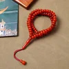 مسبحة أكريليك 99 حبة 7×9 مم بنهاية خيط قصيرة — أحمر