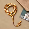 مسبحة أكريليك مسطحة 45 حبة 8 × 11 مم — F3-45C6-2-1 — بيج بنقوش فاتحة — Beige
