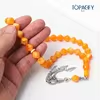 مسبحة أكريليك من 33 خرزة متعددة الأوجه 11×11.5 مم – I32-33G4-1 — K5 — أصفر مائل إلى البرتقالي مع سلاسل فضية اللون