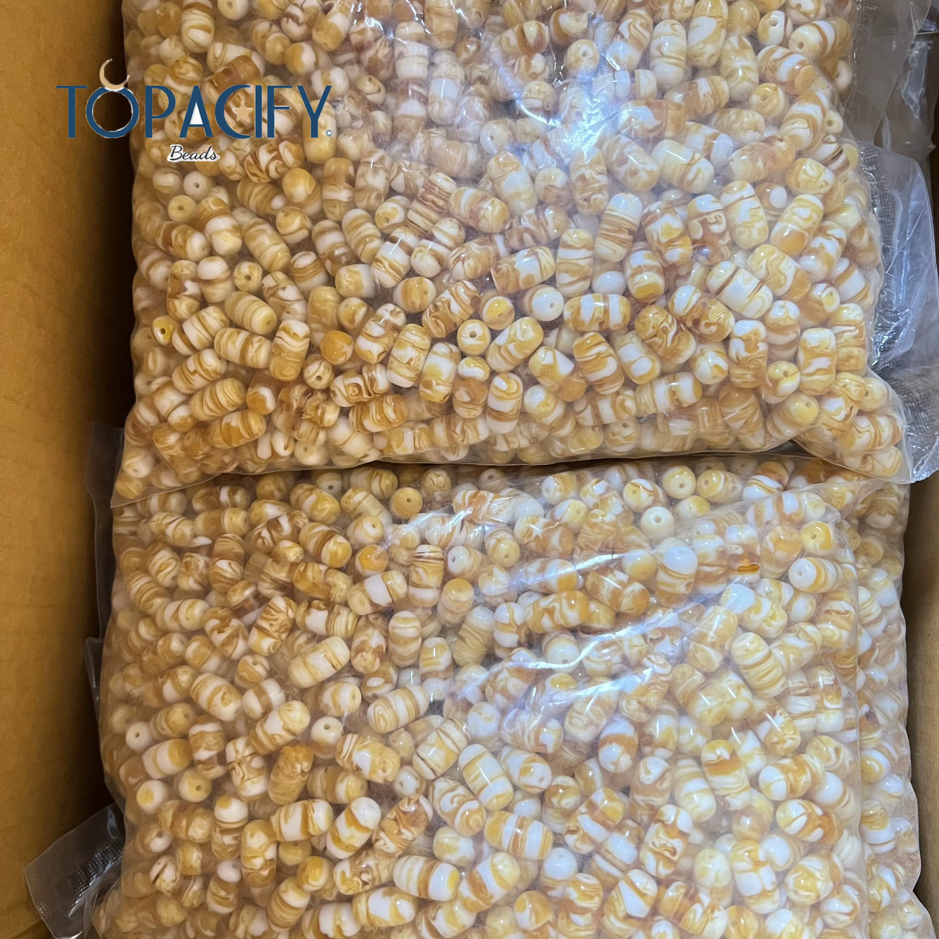 مسبحة أكريليك وراتنج 33 خرزة بيضاوية 9×16 مم بنقشة كهرمانية رخامية وشرابة صفراء – SA11-33E32-J3 — صورة تفصيلية 9