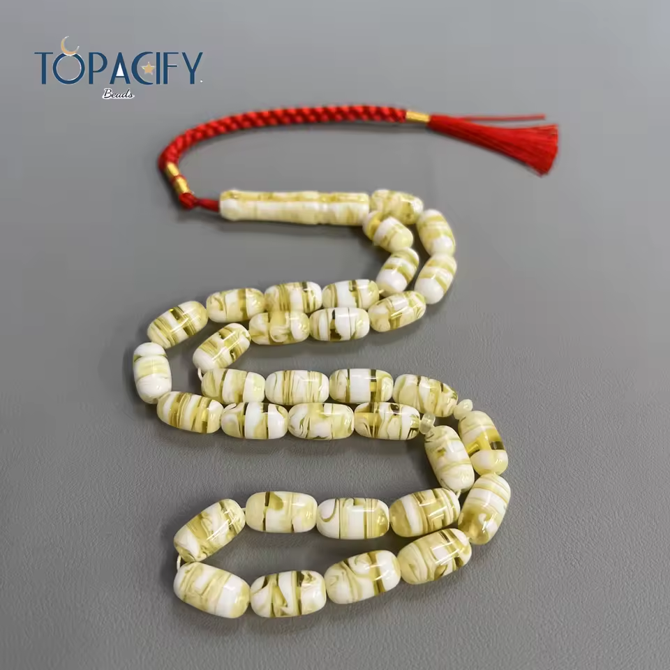 مسبحة أكريليك وراتنج 33 خرزة بيضاوية 9×16 مم بنقشة رخامية فاتحة وشرابة حمراء – SA11-33E32-J1 — صورة المنتج 1 مسبحة أكريليك وراتنج 33 خرزة بيضاوية 9×16 مم بنقشة رخامية فاتحة وشرابة حمراء – SA11-33E32-J1 — صورة المنتج 1